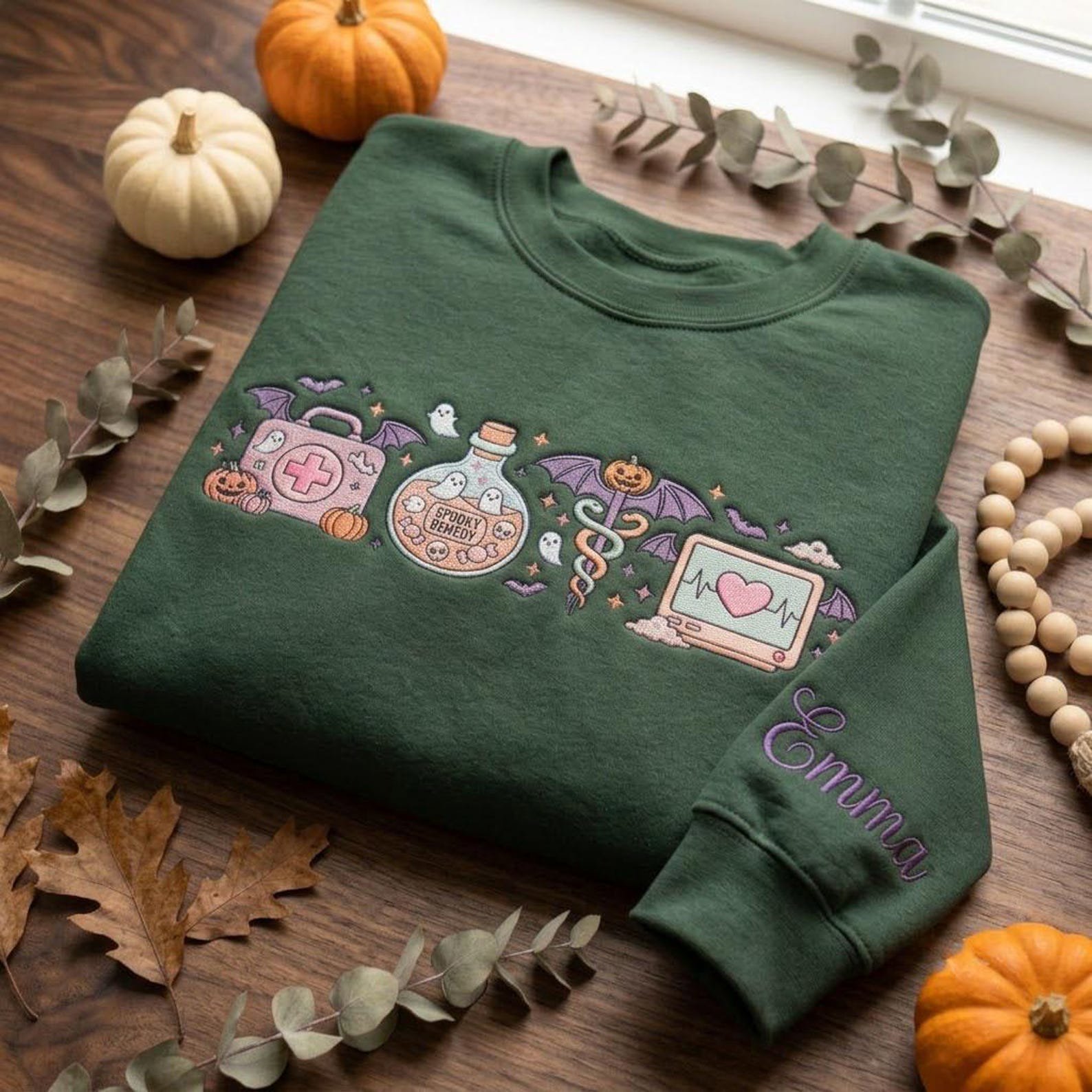 Spooky Nurse Halloween Sweatshirt, Personalized Medical Embroidery, Ghost Remedy Design, Custom Sleeve Name, Healthcare Worker Gift 2