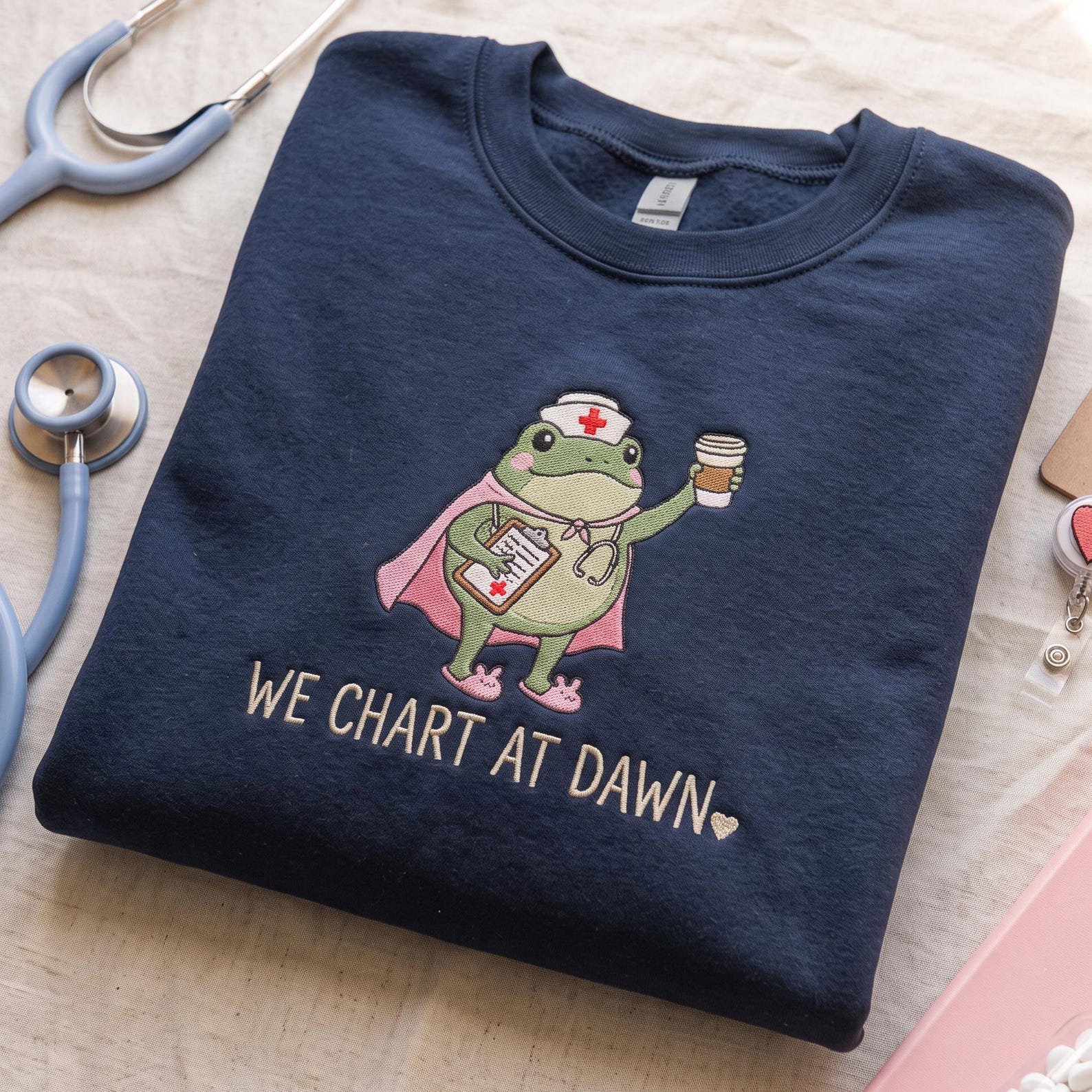 We Chart At Dawn Nurse Embroidered Sweatshirt, Funny Night Shift NICU Nurse Gift, Embroidered Frog Nurse Shirt, Healthcare Worker Shirt 1