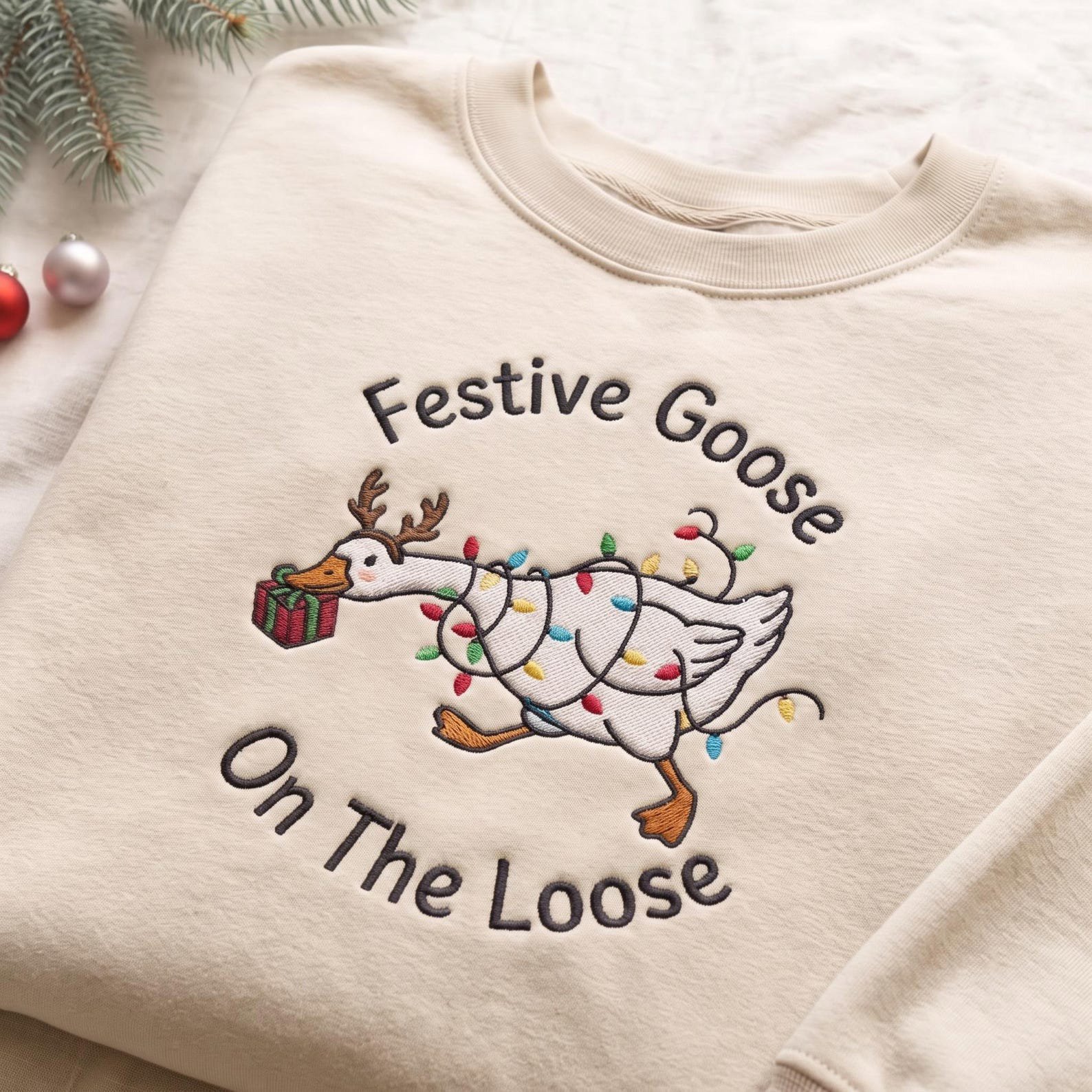 Festive Goose Embroidered Sweatshirt, On The Loose Christmas Goose Crewneck, Funny Holiday Goose Lights Reindeer Sweater Gift 3