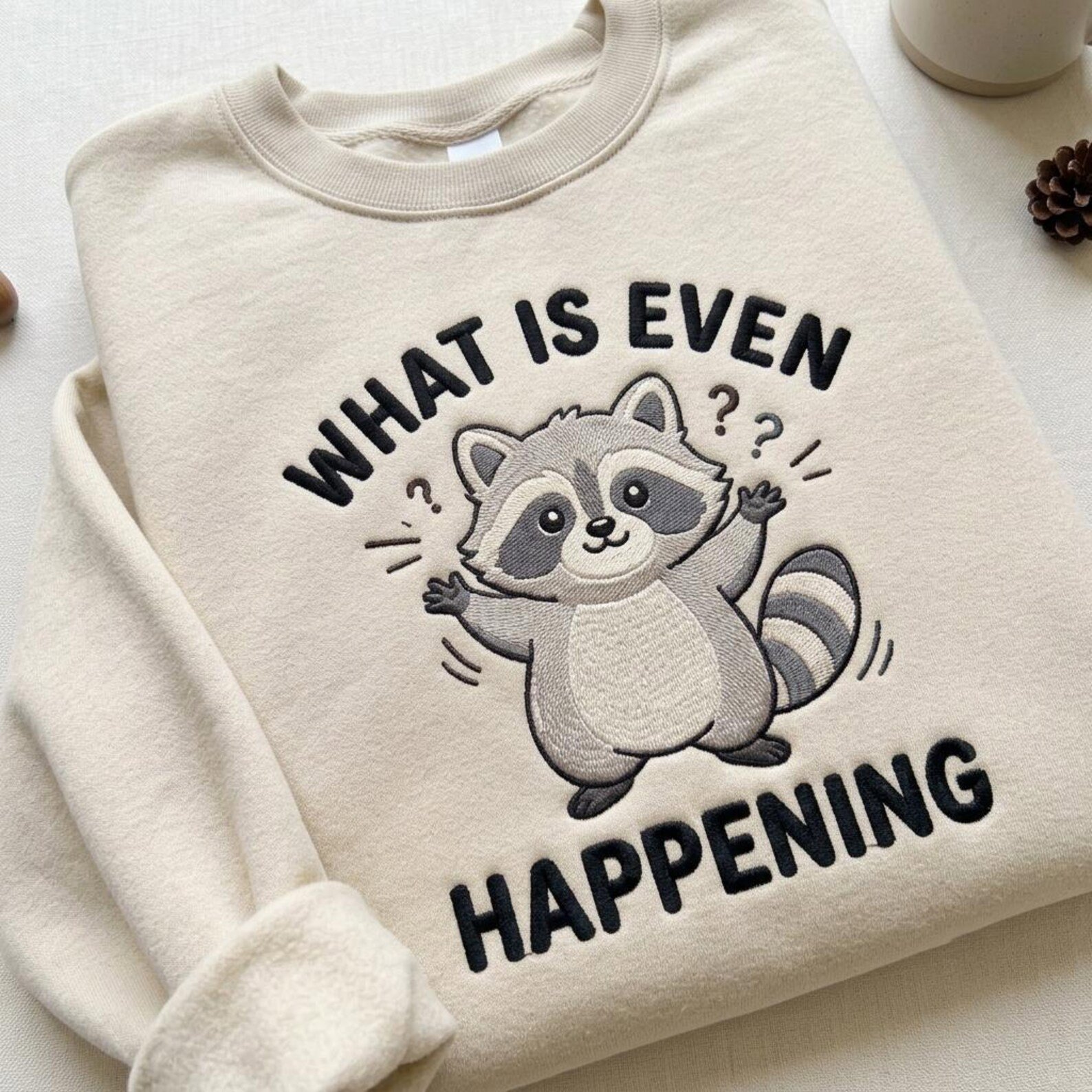 Funny Raccoon Embroidered Sweatshirt, What Is Even Happening Crewneck, Cute Chaotic Raccoon Lover Gift 1