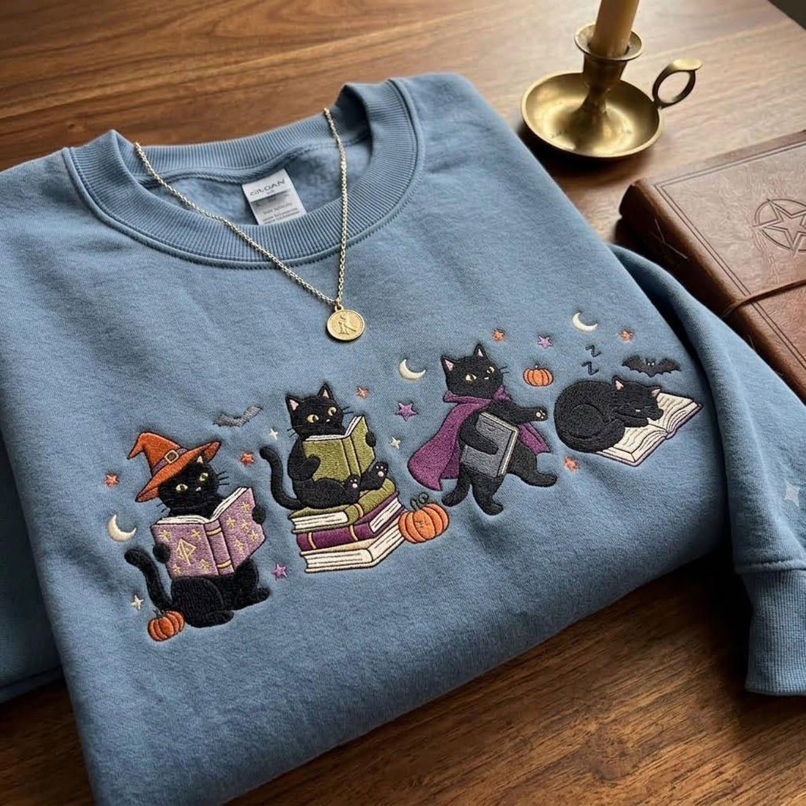 Bookish Black Cat Embroidered Sweatshirt, Halloween Reading Cats Crewneck, Spooky Books Pumpkin Shirt, Cozy Book Lover Gift 1