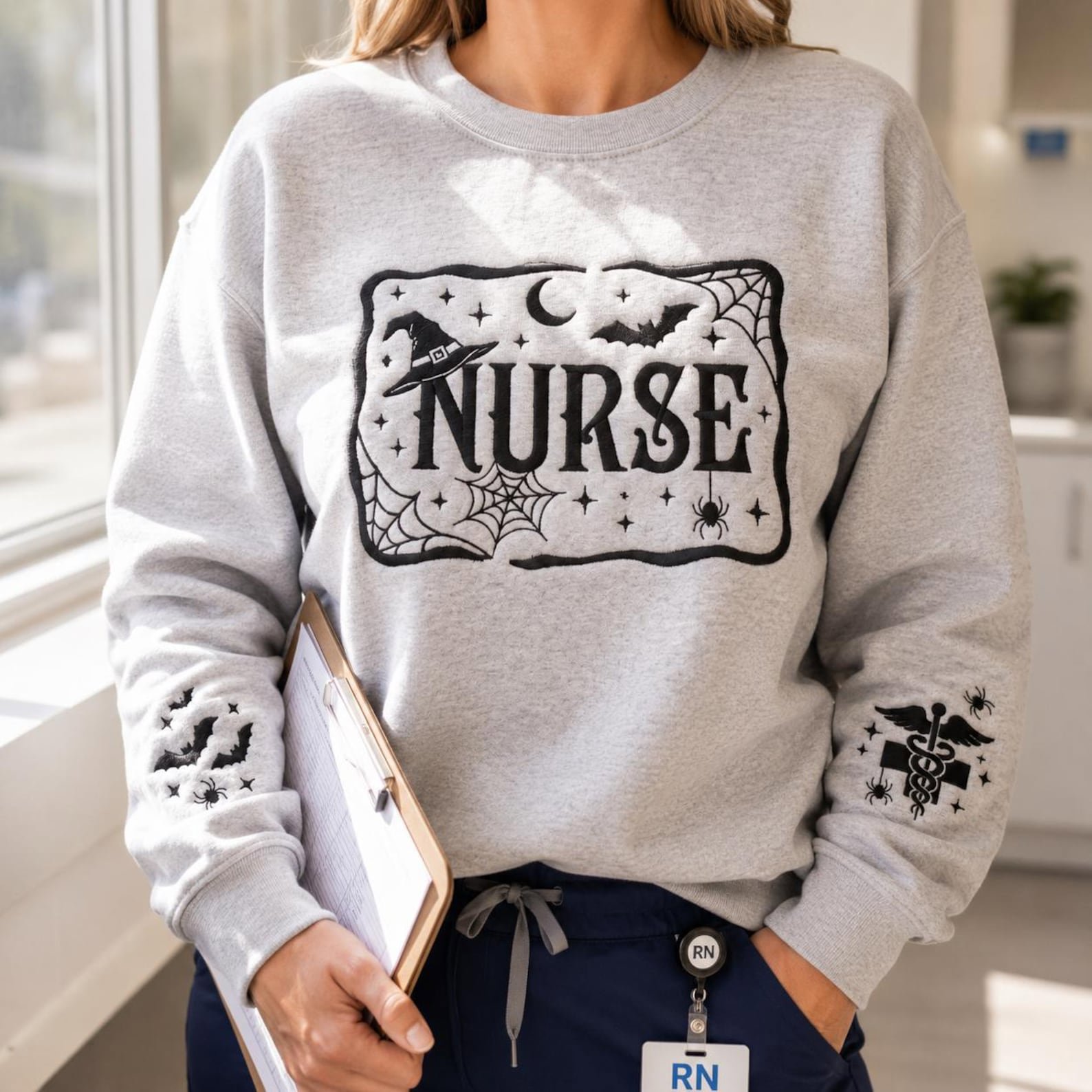 Embroidered Nurse Halloween Sweatshirt, Bat Spider Web Sleeve Embroidery, Spooky Nurse Shirt, Gothic Medical Shirt, Nurse Gift Shirt 1