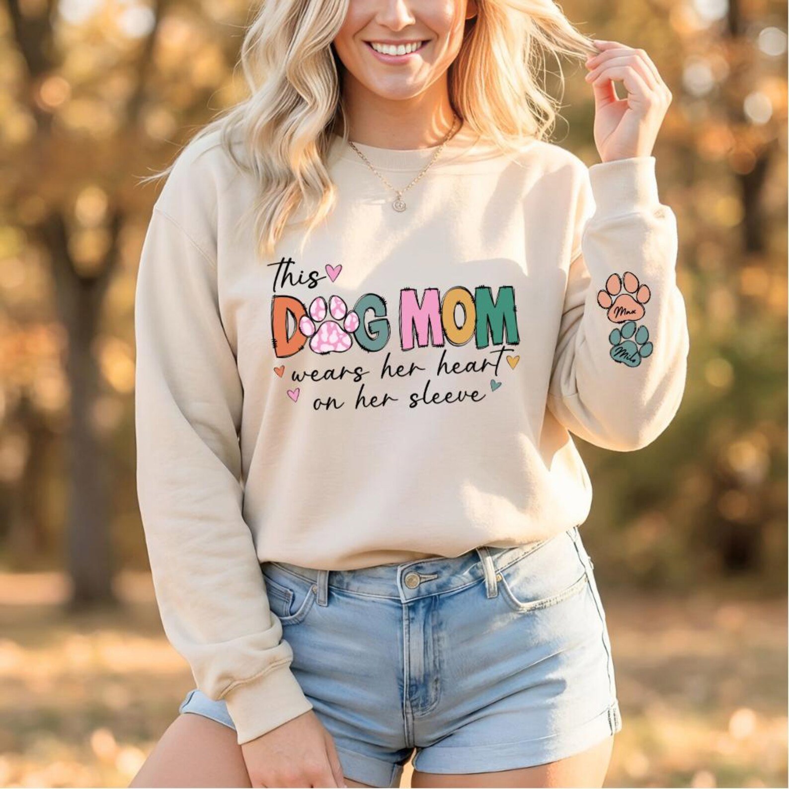 This Dog Mom Wears Her Heart on Her Sleeve Sweatshirt, Custom Dog Name Paw Sleeve Hoodie, Gift for Dog Mom, Personalized Dog Mom Top 1
