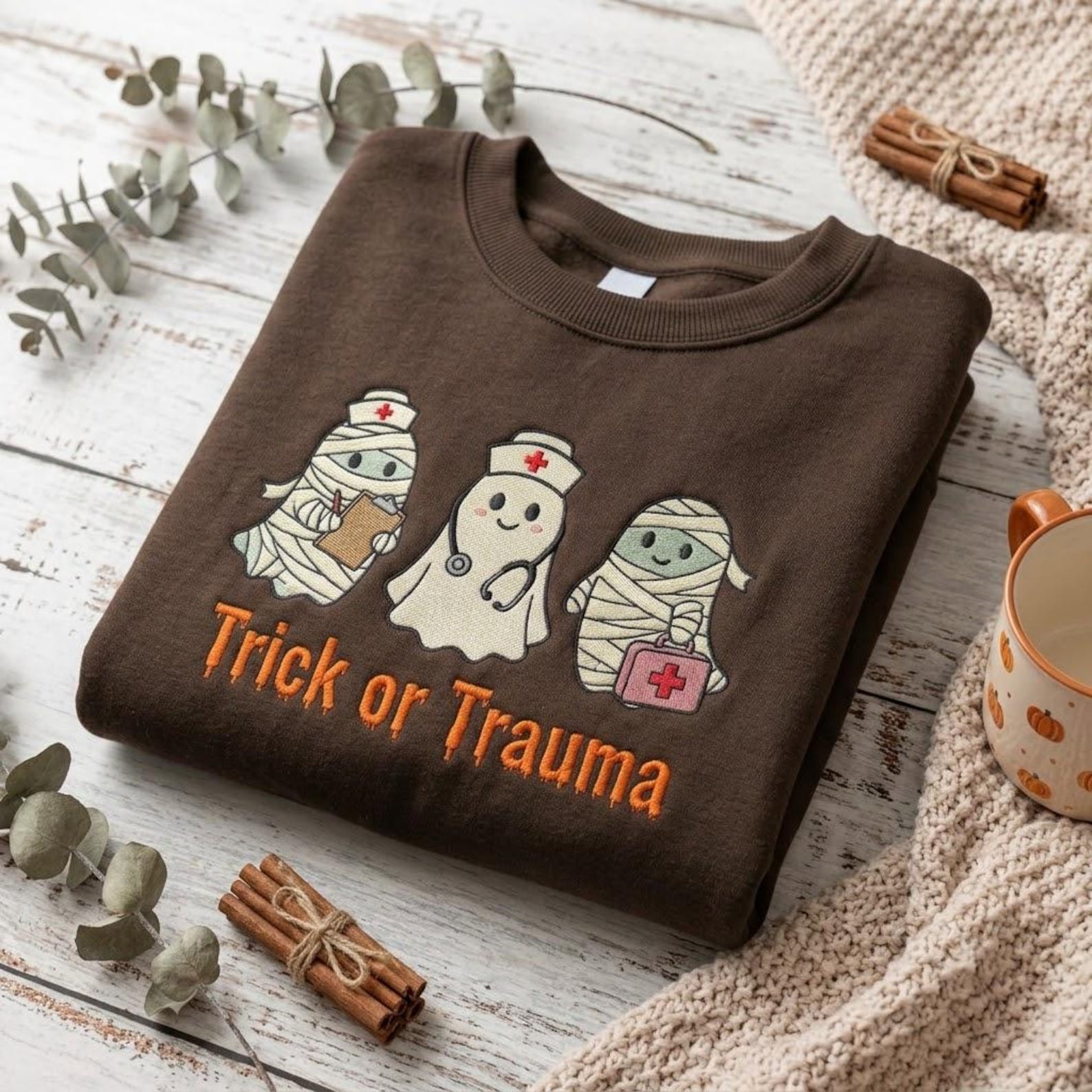 Trick or Trauma Embroidered Sweatshirt, Halloween Nurse Ghost and Mummy Crewneck, Cute Spooky RN Medical Staff Gift 1