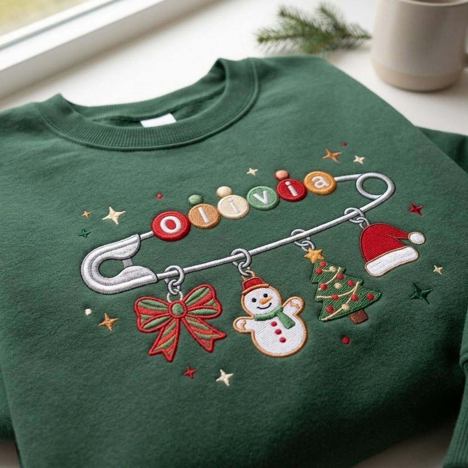 Personalized Christmas Name Sweatshirt, Custom Embroidered Safety Pin Crewneck, Holiday Charm Sweater, Christmas Family Gift 3