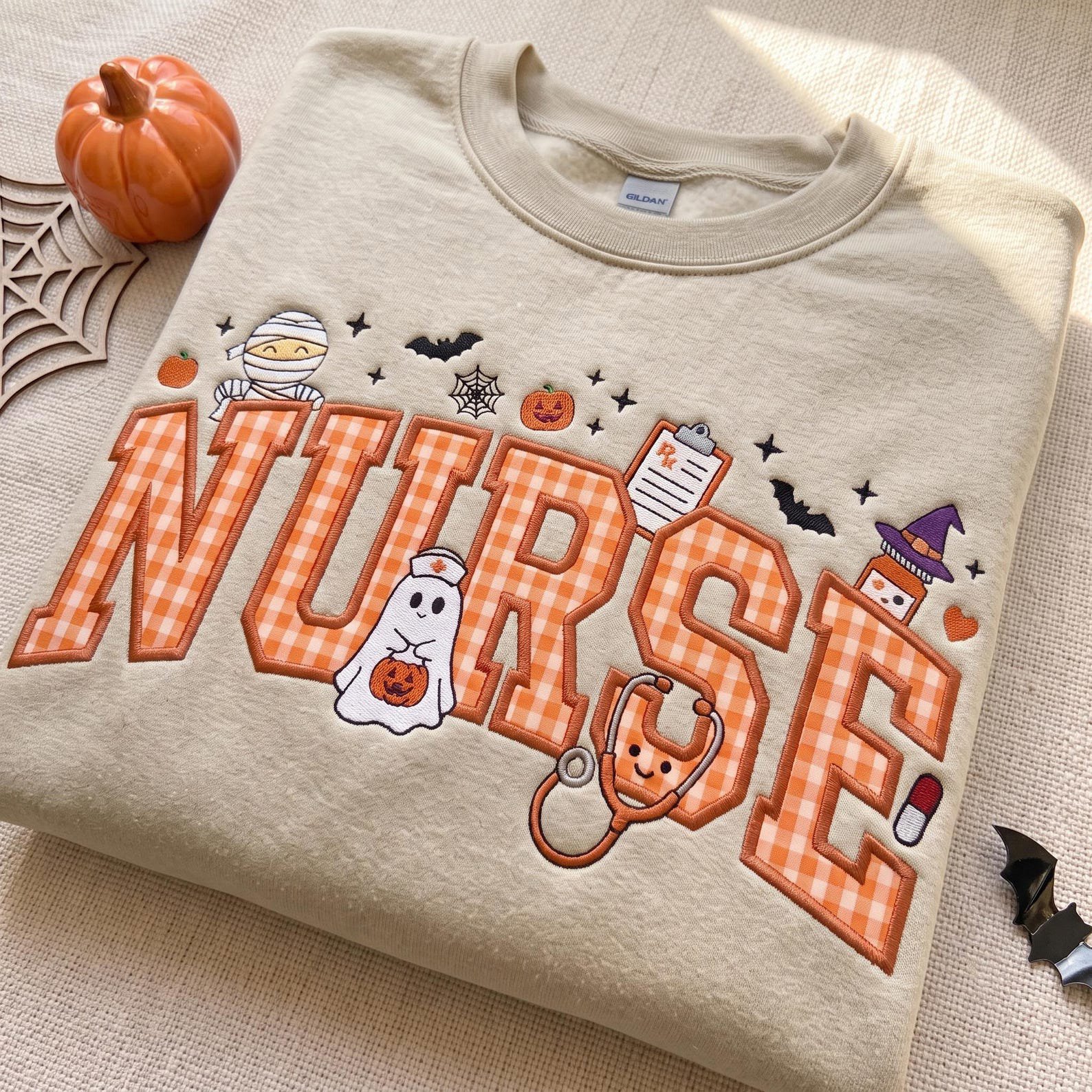Embroidered Halloween Nurse Applique Sweatshirt, Gingham Spooky Ghost Medical Shirt, Cozy Fall Spooky Hospital Pullover, RN Nurse Gift 1